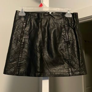 Black faux leather mini skirt
